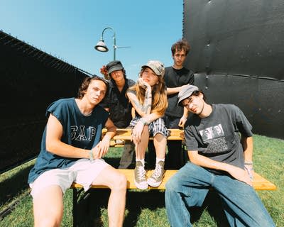 members of the band porch light posing for a photo