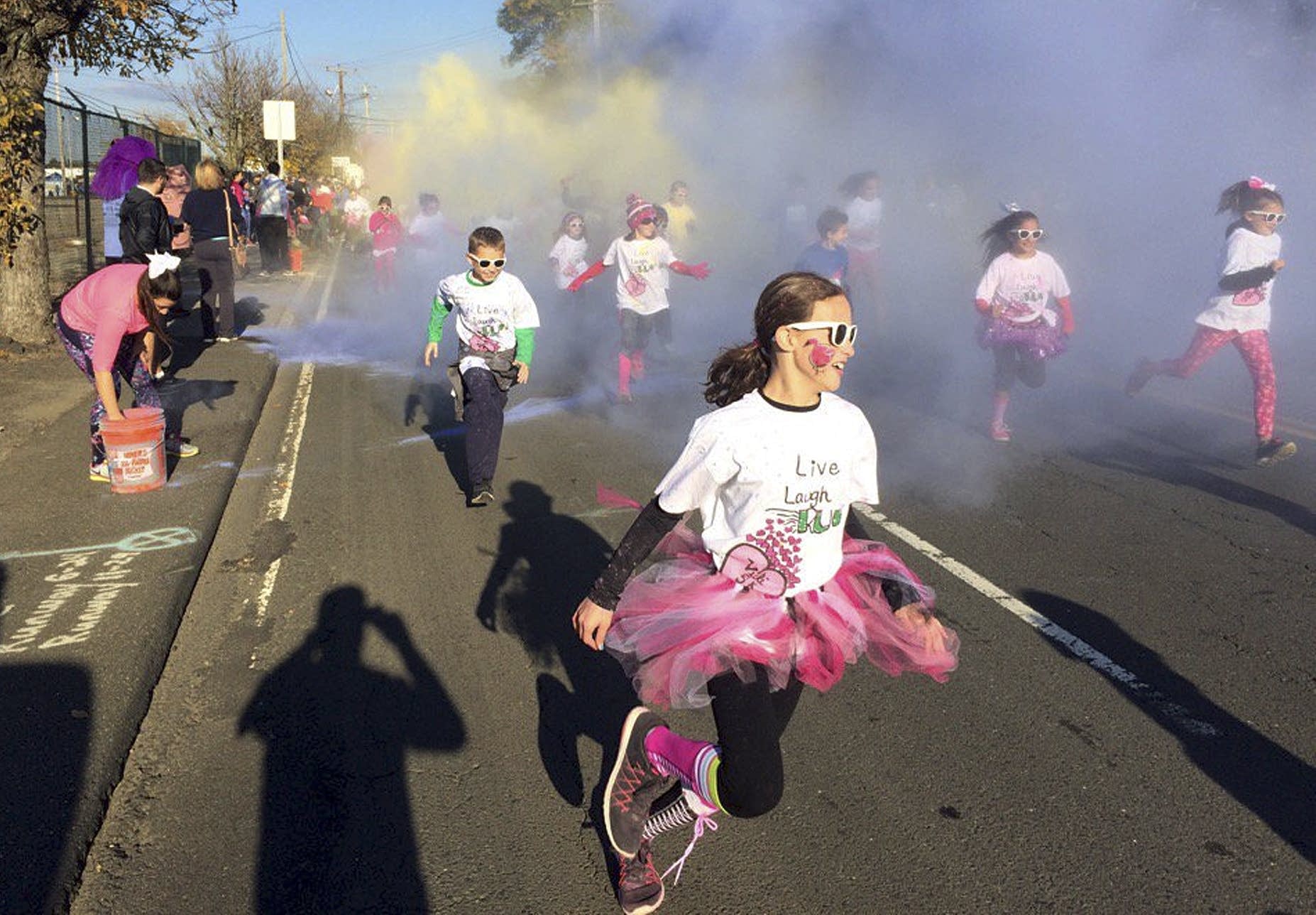 Children participate in the fun run at the annual Vicki Soto 5K race.