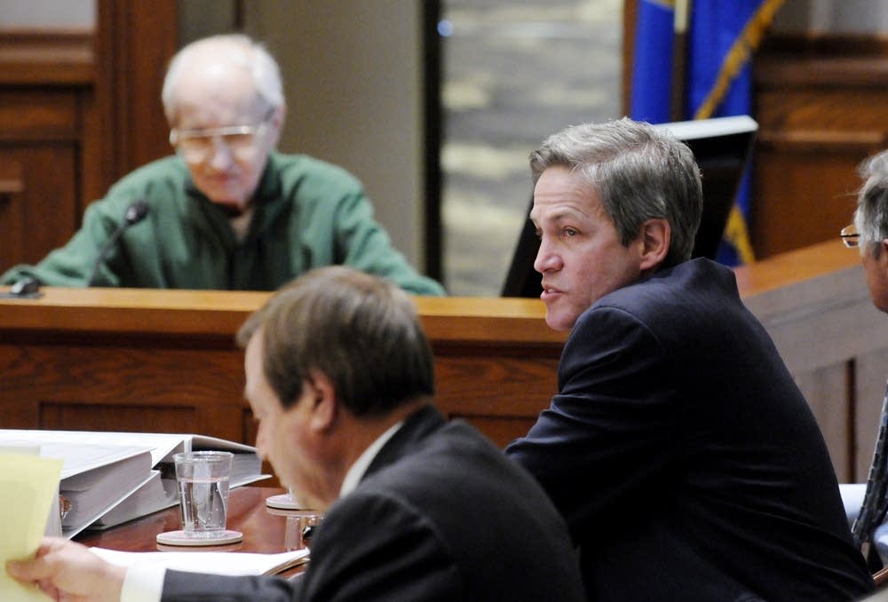 Norm Coleman listens to Gerald Anderson