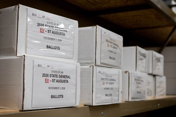 Boxes of ballots sorted for the specific races applicable to each city