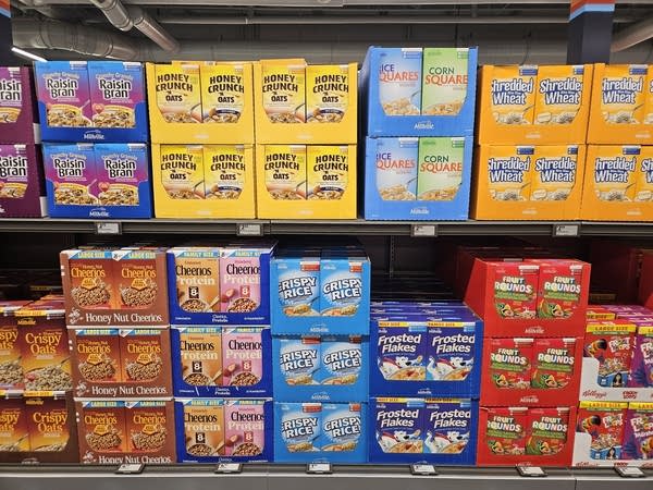 Stacks of cereal boxes on shelves