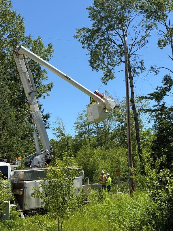 Crews repairing downed power line