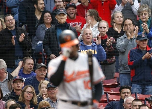 Standing ovation for victim of racist taunts