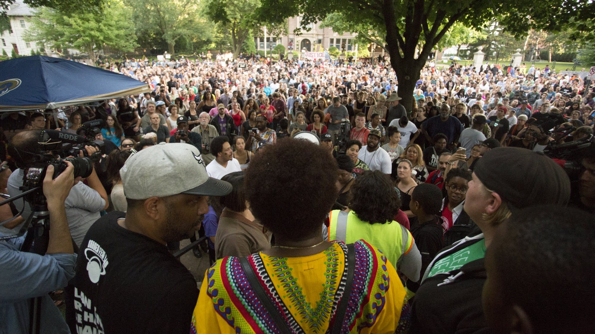 The crowd at the governor's residence.