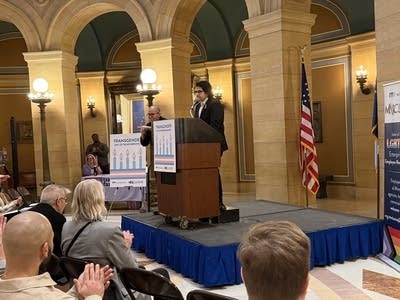 A group gathers in the Minnesota Capitol rotunda.