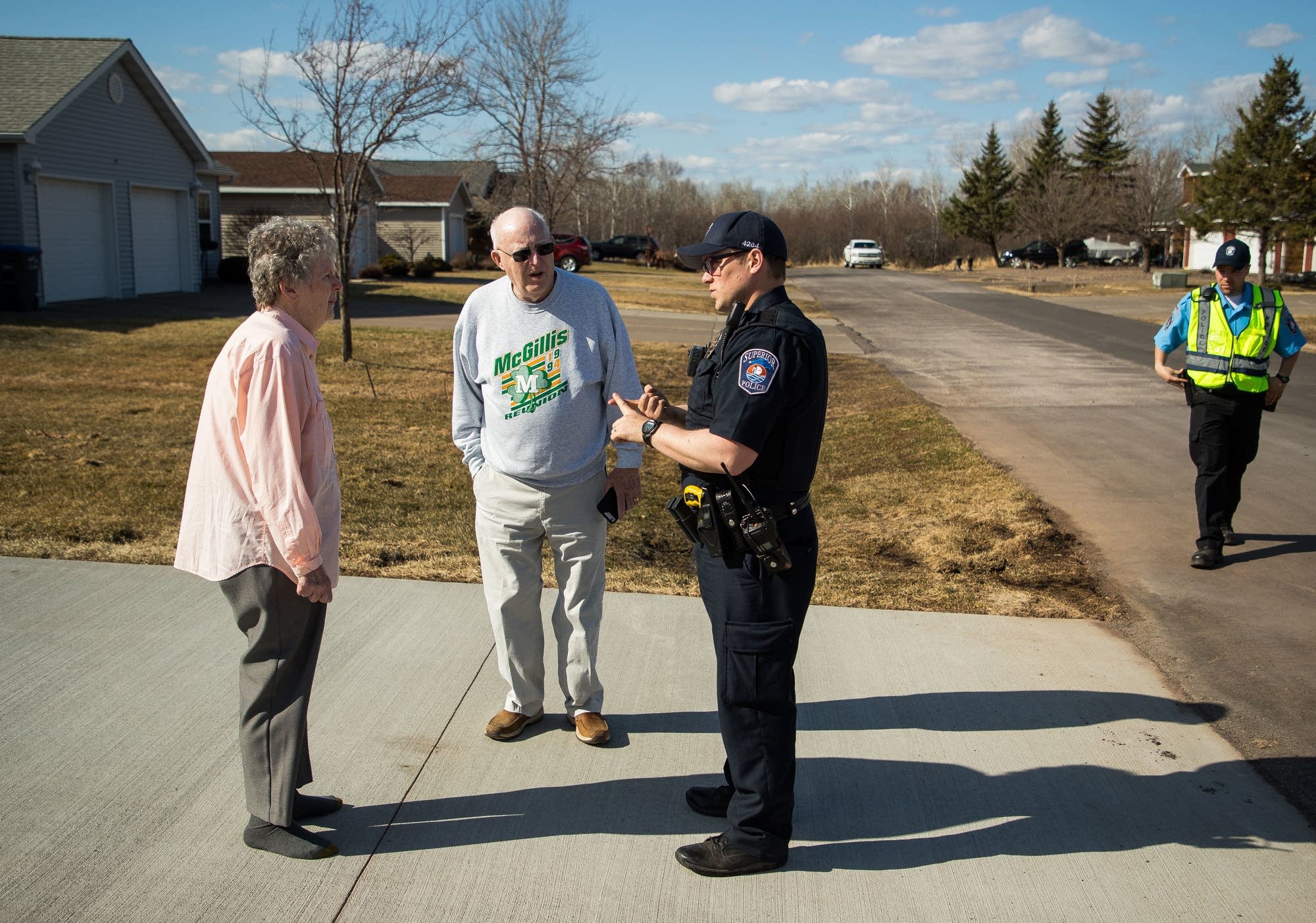 Superior officer Patrick Deignan talks to Connie Jackson and Gene McGillis.