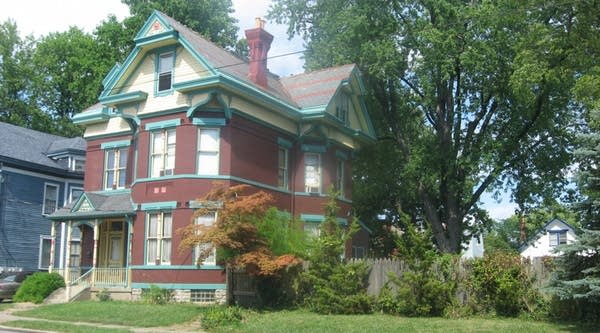 A house on Beech Avenue in Cincinnati, Ohio.  In Cincinnati's East Price Hill, Ken Smith runs a community development corporation Price Hill Will. Their community development work includes buying neglected buildings that are unattractive to investors, and rehabbing them into beautiful homes. Smith shows me a stately yellow two-story on Beech Avenue. "The street has a lot of potential, and has a lot of investment," he says.