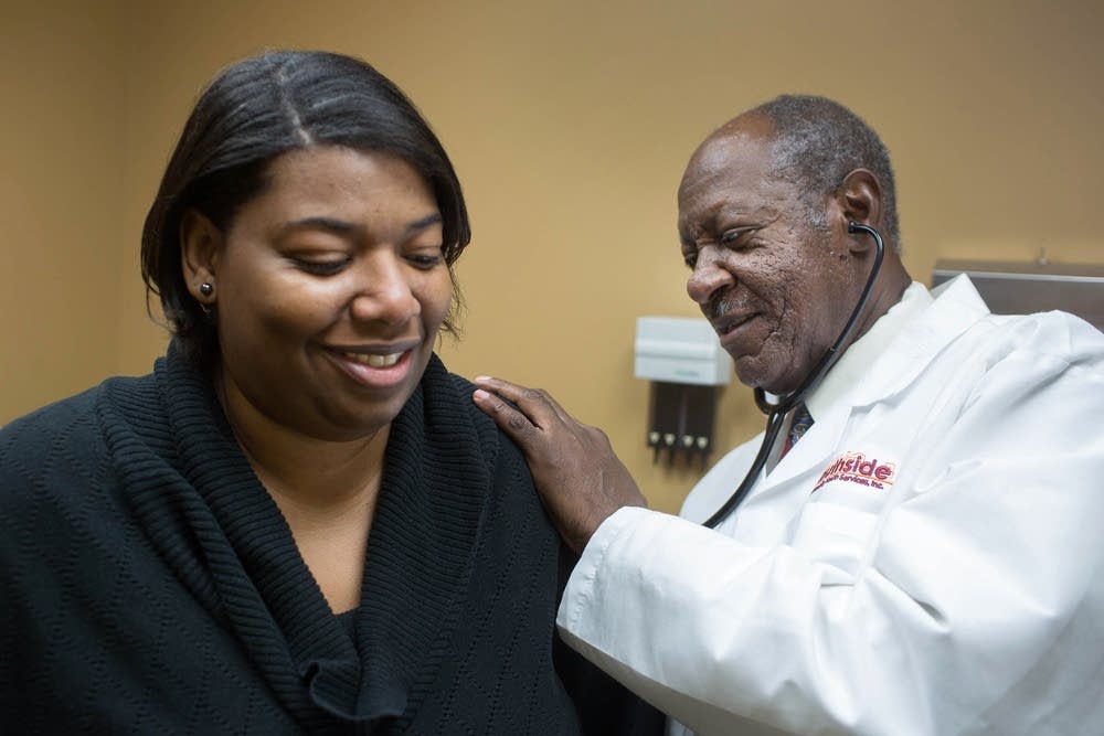 Dr. Fred Lewis sees a patient