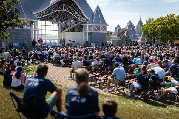 Peope attend a memorial