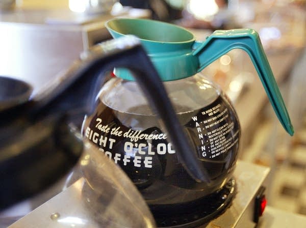 EVANSTON, IL - OCTOBER 1:  Coffee pots are seen on the counter of the Cafe Express coffee house October 1, 2004 in Evanston, Illinois. In a recent study, researchers say just one cup of coffee a day causes caffeine addiction.