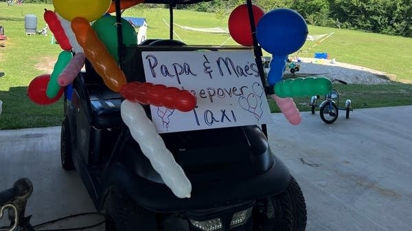 A "sleepover taxi" (golf cart) used by D'Angelo's father to chauffeur his grandchildren around the family's compound.