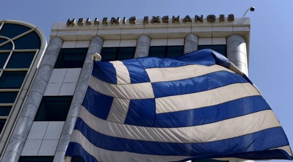 A Greek flag is pictured outside the Athens Stock Exchange in Athens on Monday. 