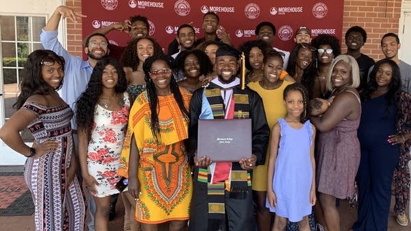 Elijah Dormeus is “literally still in awe of the love that was given to the class, all 400 of us.” Above, Dormeus is surrounded by his family at his Morehouse graduation in 2019. 
