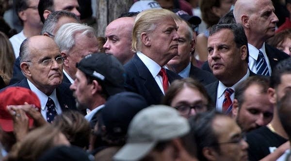 Possible Trump cabinet members include former New York City Mayor Rudy Giuliani, left, and New Jersey Gov. Chris Christie, right. They appear with Donald Trump, above, at a National 9/11 Memorial service on September 11, 2016, in New York.