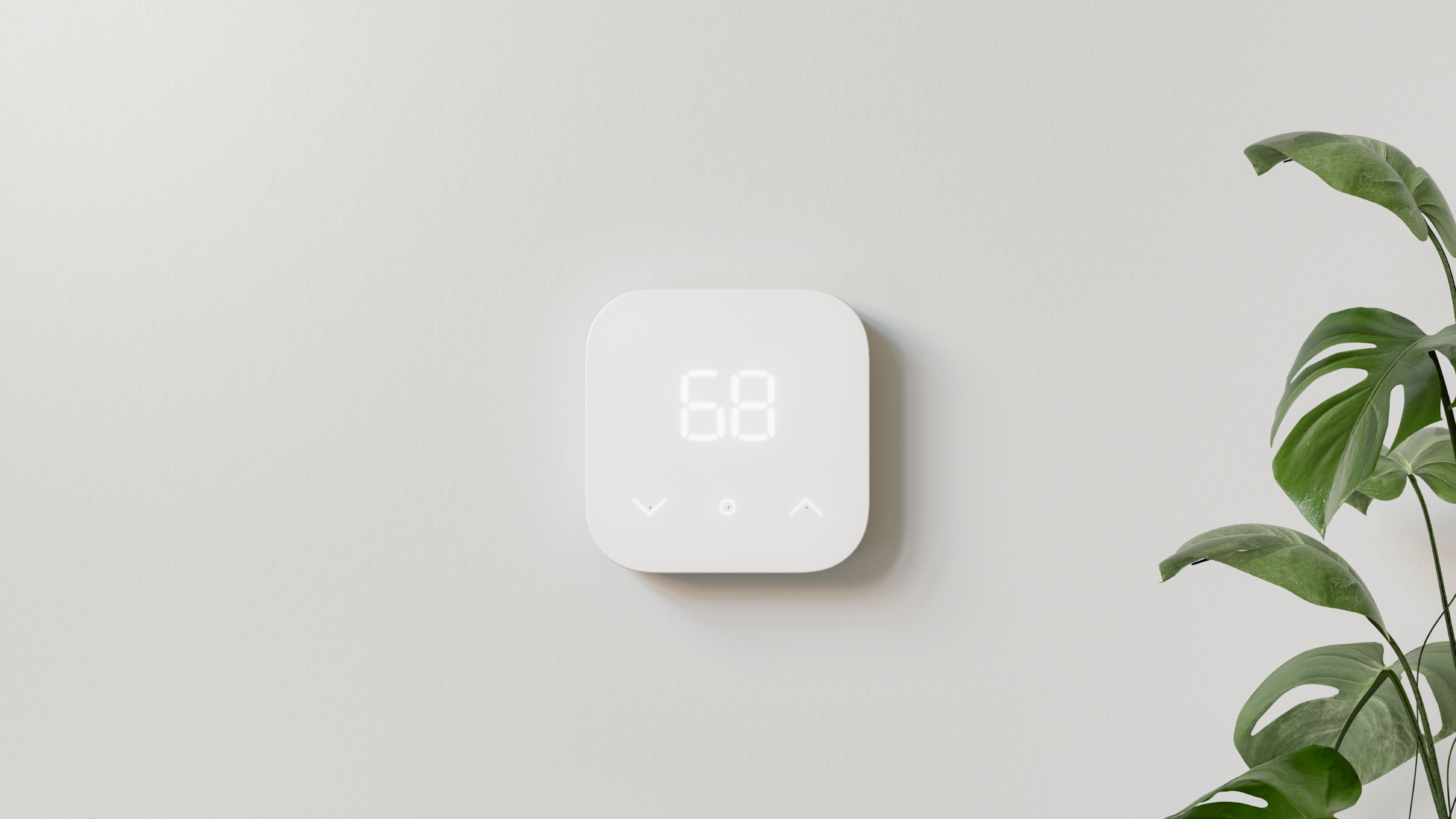 A white Amazon smart thermostat.