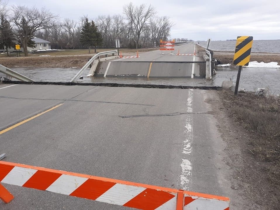 Rural Norman Co. bridge collapses in flood