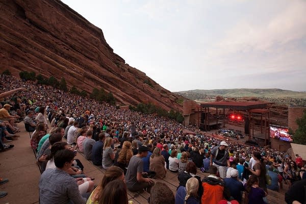 View of a massive outdoor amphitheater in the Rockies foothills