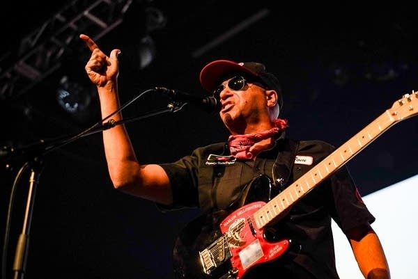 Tom morello performing on stage