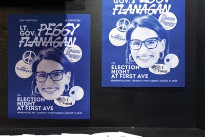 Blue posters with a persons face-3
