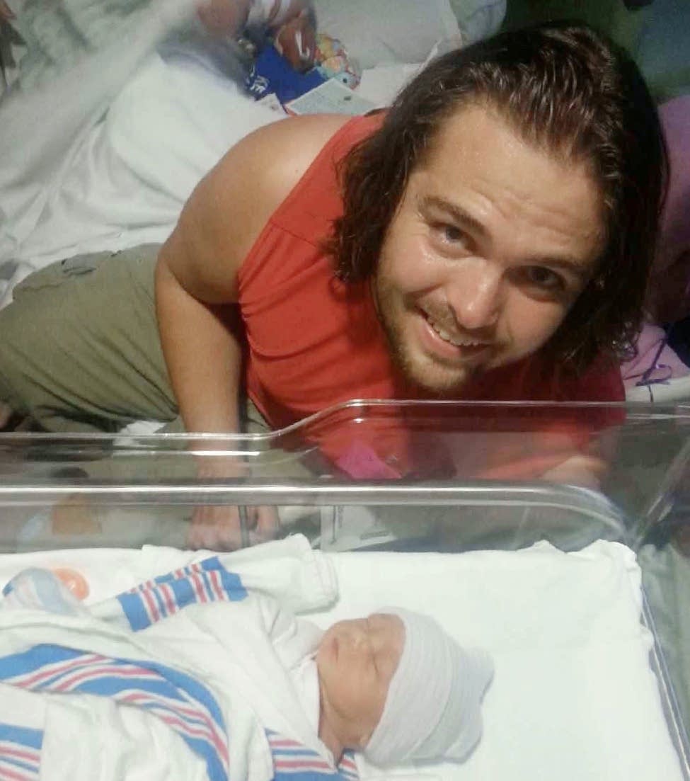Max Tillitt poses for picture with his son.