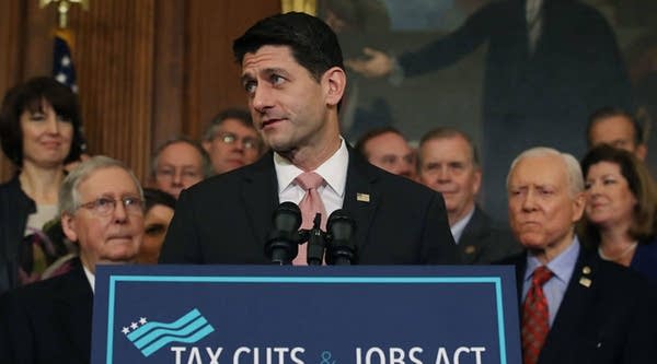 U.S. House Speaker Paul Ryan (R-WI), flanked by Republican lawmakers, speaks during an enrollment ceremony for the conference report to H.R. 1, the Tax Cuts and Jobs Act that was passed by the House and Senate, on Dec. 21, 2017, in Washington, D.C.