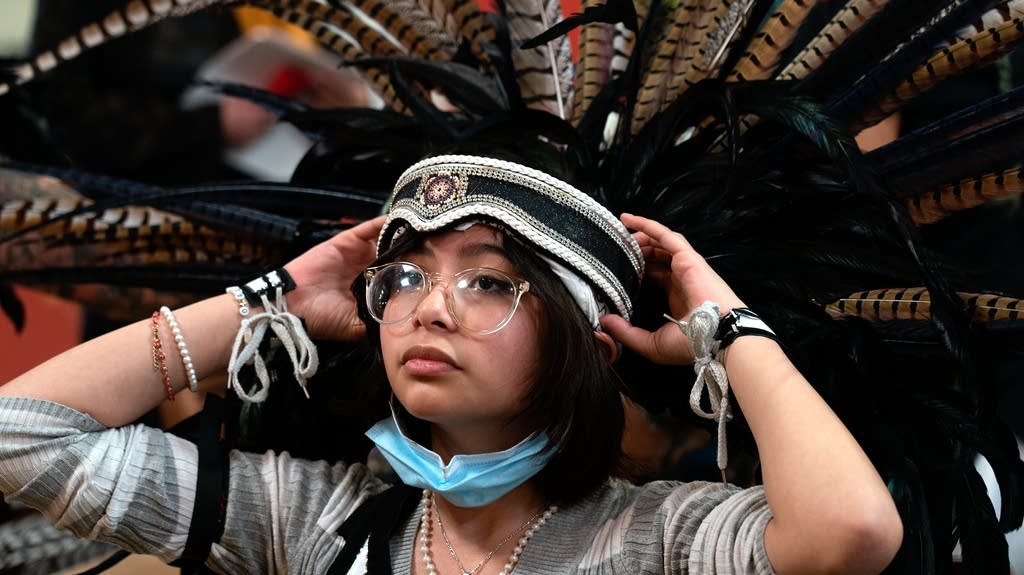 Aztec dance group hosts 'reimagined' May Day festival | MPR News