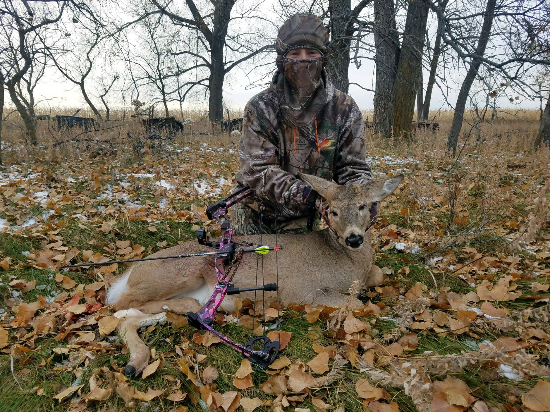 Misty Stoll with the deer she shot on Oct. 28.