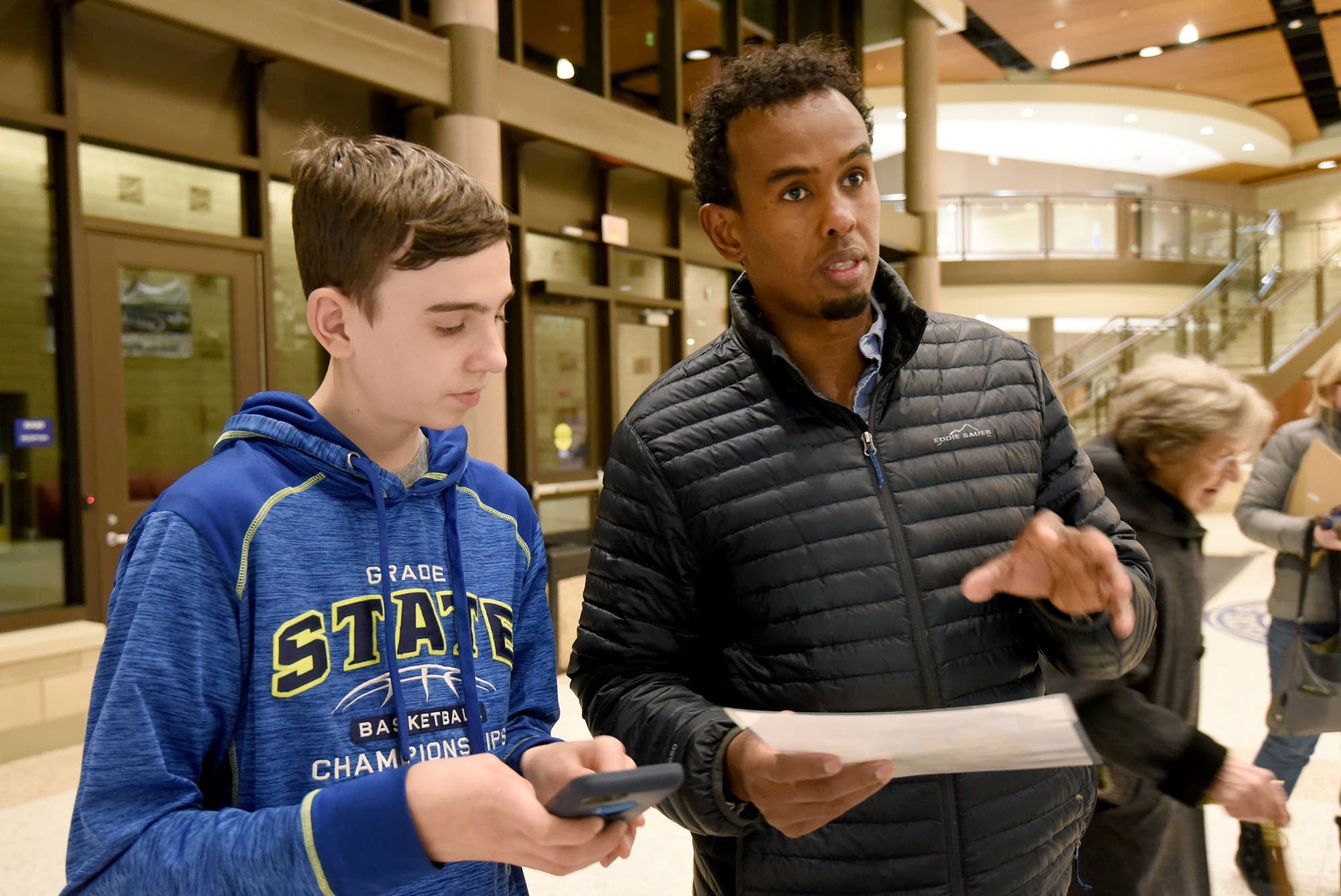 Abdiaziz Dafar is attending his first DFL caucus at Simley Senior High.