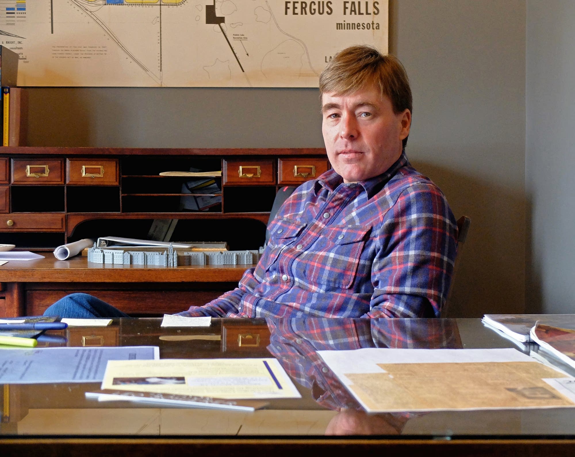 Fergus Falls Mayor Ben Schierer sits for a portrait in his office.