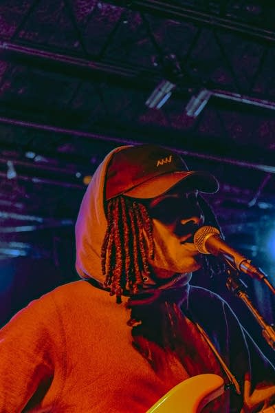 Lutalo performing on stage