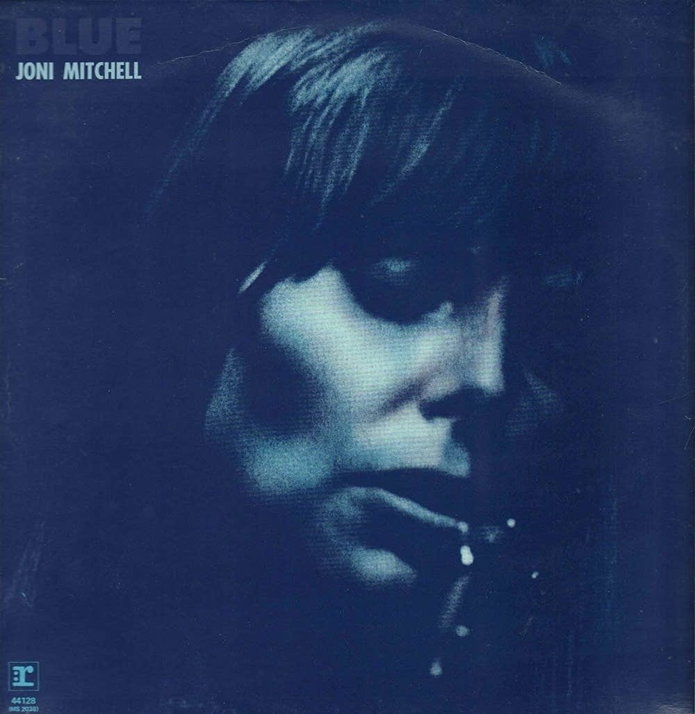 album cover of Joni Mitchell's Blue, it features her portrait overlaid with a blue-color filter