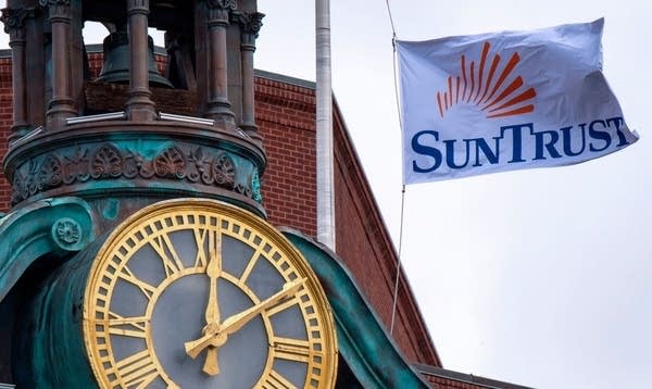 A Sun Trust bank flag flies above their bank in downtown Washington, DC. 