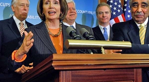 House Democrats talk to reporters at news conference after the House approved the economic stimulus bill. From left, Majority Leader Steny Hoyer of Maryland, Speaker of the House Nancy Pelosi of California, Democratic Caucus Chair Rep. John Larson of Connecticut, Democratic Congressional Campaign Committee Chair Rep. Chris Van Hollen of Maryland, and Ways and Means Committee Chairman Charlie Rangel of New York.