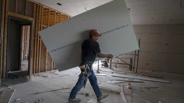 A man works at a commercial construction project in Rio Grande City, Texas.