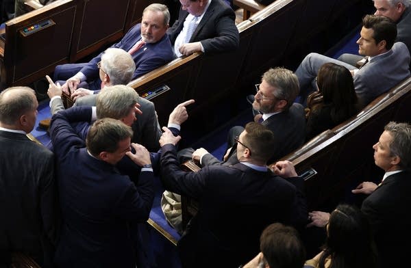 WASHINGTON, DC - JANUARY 06: U.S. Rep.-elect Mike Rogers (R-AL) is restrained after getting into an argument with Rep.-elect Matt Gaetz (R-FL) in the House Chamber during the fourth day of voting for Speaker of the House at the U.S. Capitol Building on January 06, 2023 in Washington, DC. The House of Representatives is meeting to vote for the next Speaker after House Republican Leader Kevin McCarthy (R-CA) failed to earn more than 218 votes on several ballots; the first time in 100 years that the Speaker was not elected on the first ballot.