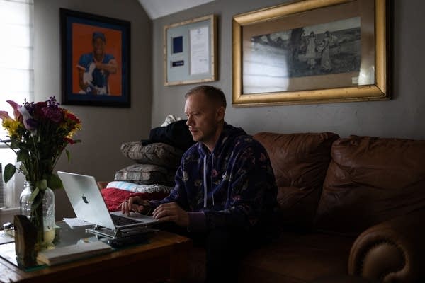 A man sits in his living room