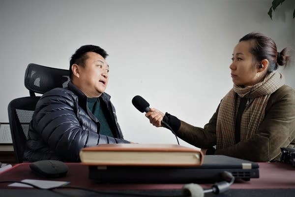 E-commerce Wish vendor Bai Haitao tells Marketplace it has been a roller coaster year from the pandemic to postal rates. (Charles Zhang/Marketplace)