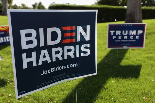 Campaign signs for then-Democratic presidential nominee Joe Biden and former President Donald Trump outside the Lake Recreation Center on Nov. 3 in Peoria, Arizona.