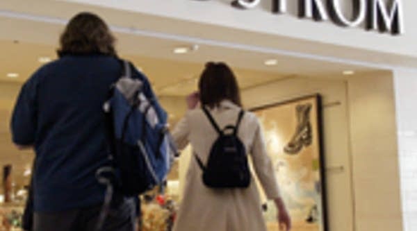 Shoppers enter a Nordstrom store
