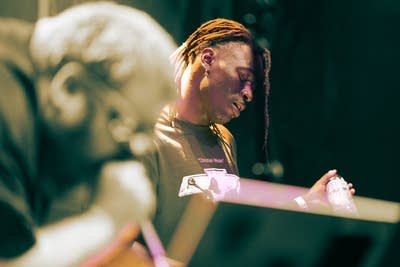 2 men performing on stage