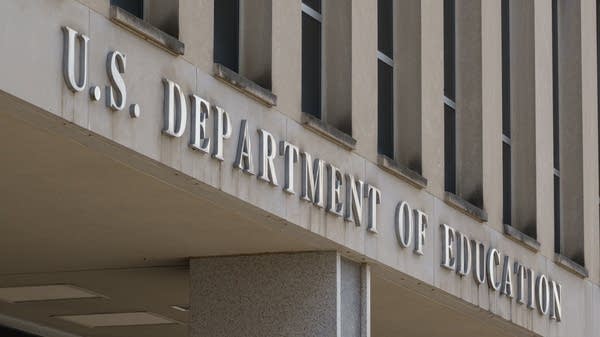A sign is displayed outside of the Lyndon Baines Johnson Department of Education building 