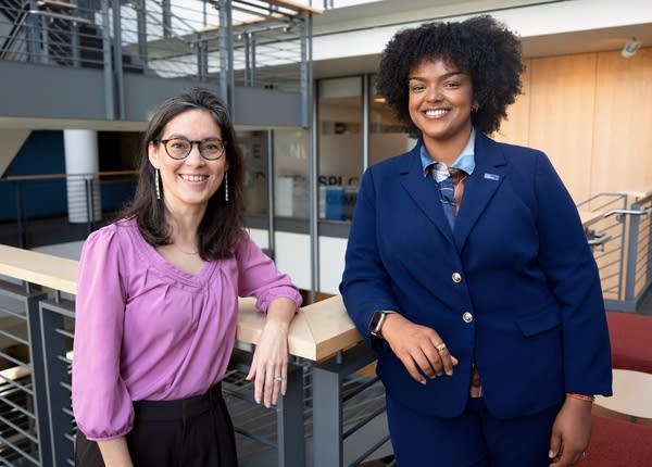 two women posing for a portrait