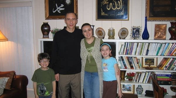 The Zerroug family, from left to right: Youssef, Mourad, Amina, and Hanaa, in the living room of their Pasadena home, which they bought with a Muslim mortgage.