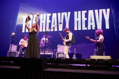 The Heavy Heavy performing on stage