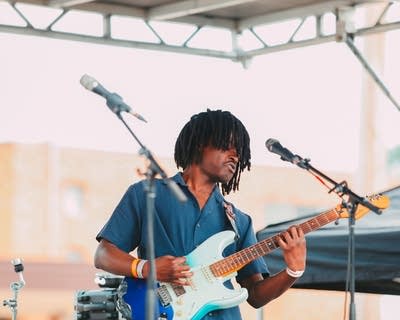 Miloe performing on stage