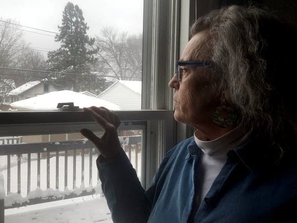 Karbon of St. Paul looks at snow that fell during an April snowstorm