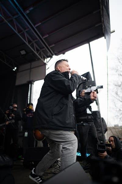 man sings into a microphone