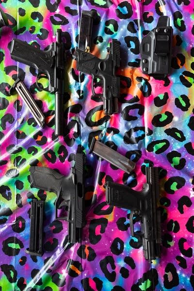Guns sit on a table