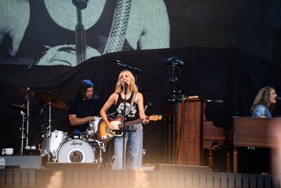 Sheryl Crow performing on stage