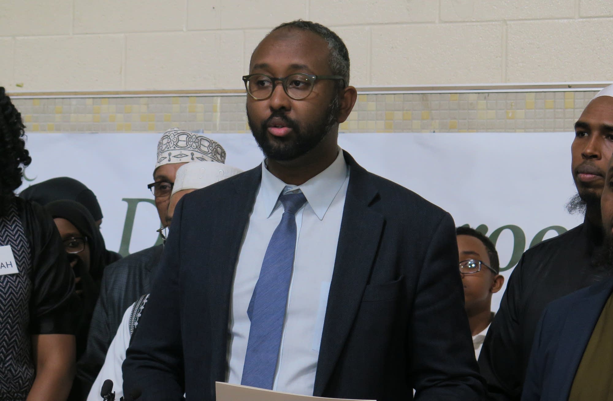 Jaylani Hussein speaks at a press conference